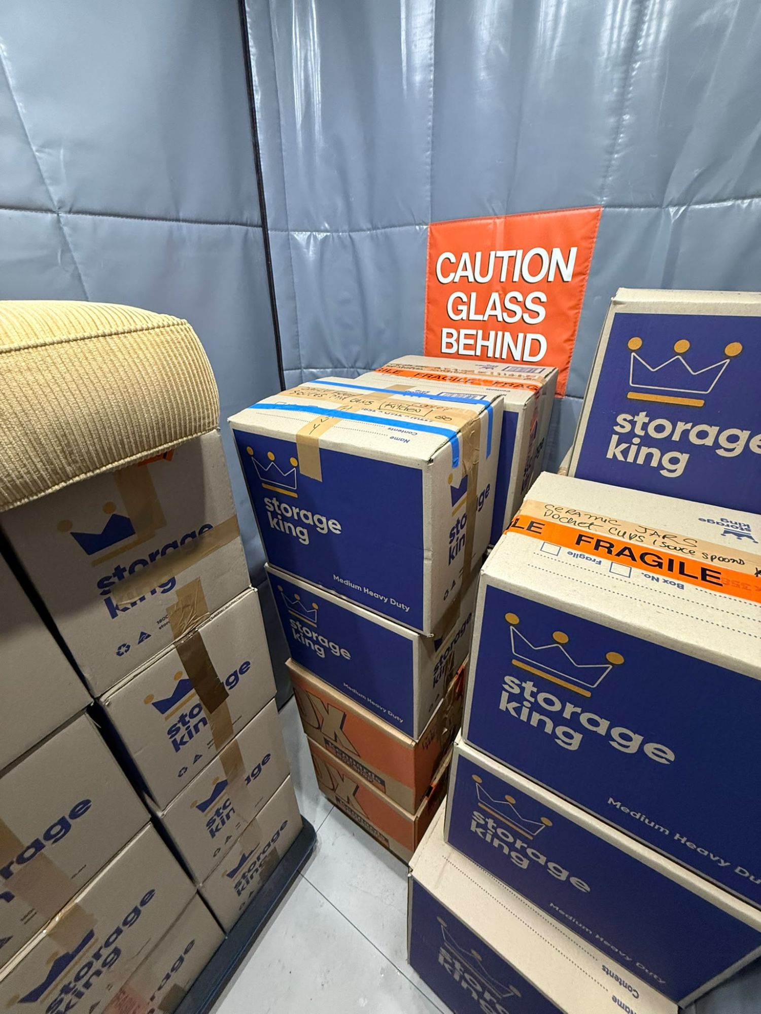 Labelled fragile boxes stacked in a Sydney storage unit